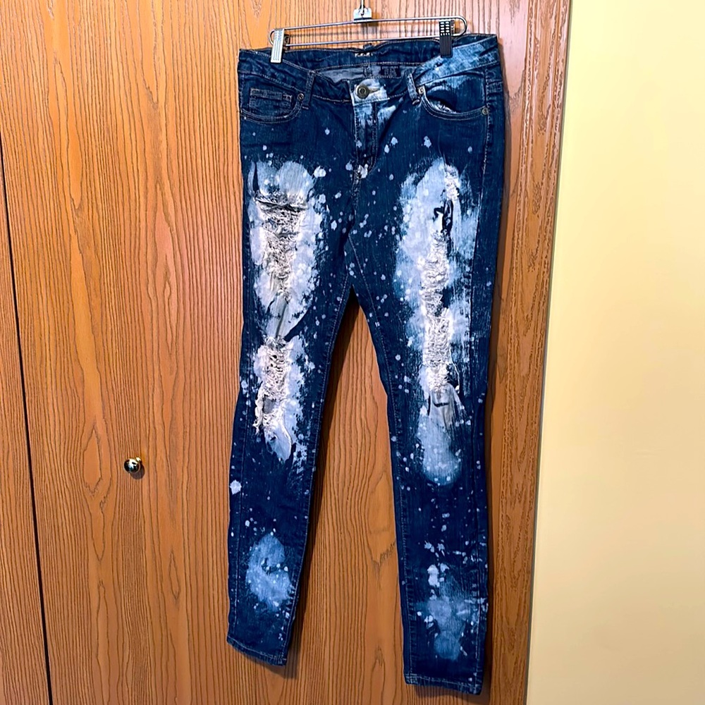Beautiful bleach out holy jeans